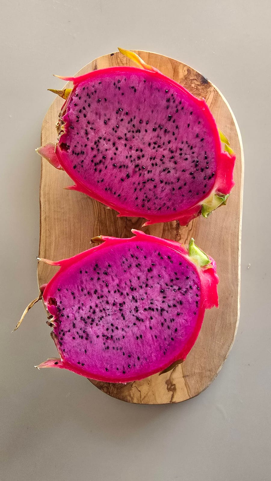 dragon fruit fruit cross-section showing flesh colors growing at the Sky Botanicals farm